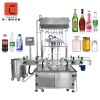 Multi Heads 6 Nozzles Liquid Filling Machine 250ml 1000ml Water Bottle Glass Plastic Bottle Sealing And Filling Machine